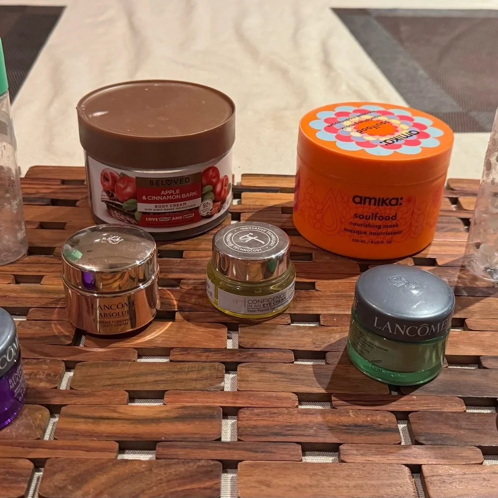 9 empty cosmetic containers: 2 glass ones & 7 plastic ones, variety of sizes